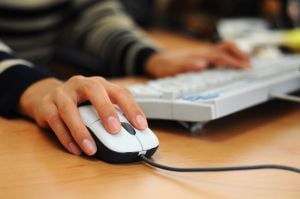 woman using computer 1208422 m